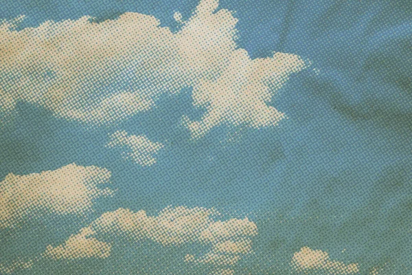 retro sky pattern on old paper texture. vintage clouds.