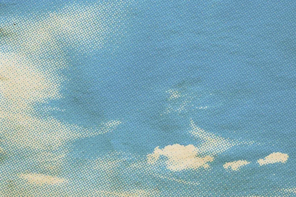 retro sky pattern on old paper texture. vintage clouds.