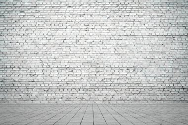 Duvarı tuğlalı ve döşemesi fayanslı boş bir oda. İç arkaplan.