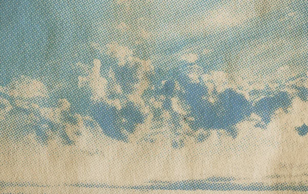 retro sky pattern on old paper texture. vintage clouds.