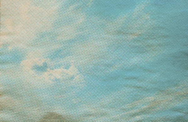 retro sky pattern on old paper texture. vintage clouds.