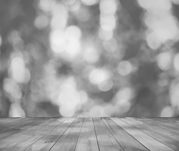 Bright bokeh and wooden floor — Stock Photo, Image