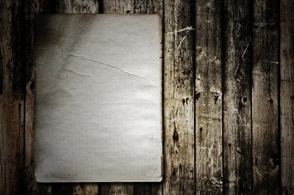 Paper on old wood texture — Stock Photo, Image