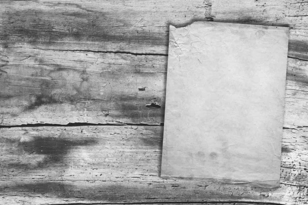 Paper on wooden texture — Stock Photo, Image