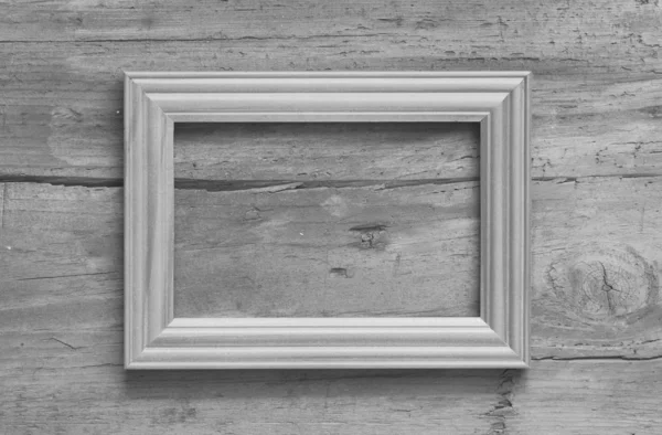 Photo frame on old wall — Stock Photo, Image