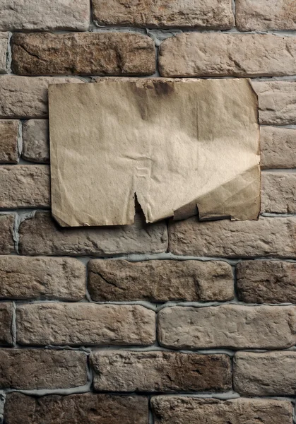 Vieux papier sur le mur — Photo