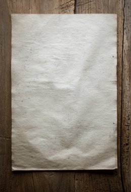 Kağıt ahşap zemin üzerinde