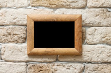 tuğla duvar fotoğraf çerçevesi
