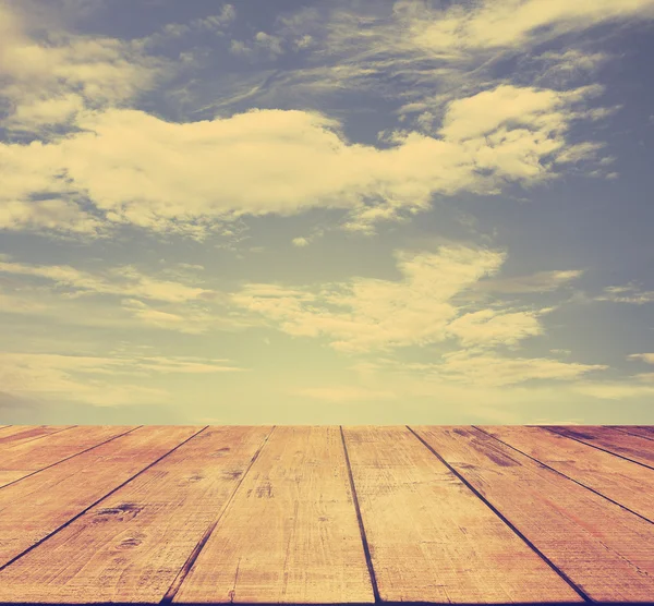 Sunset sky and wood floor — Stock Photo, Image