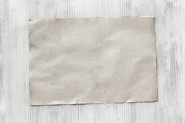 Kağıt ahşap zemin üzerinde