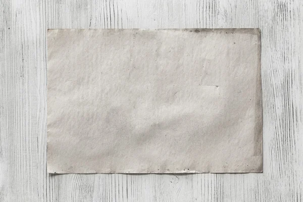 Kağıt ahşap zemin üzerinde
