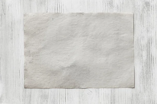 Kağıt ahşap zemin üzerinde