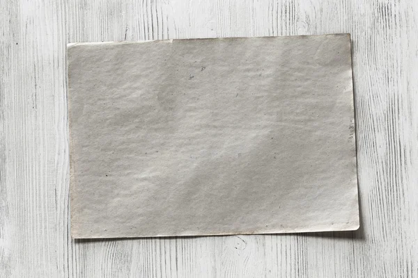 Kağıt ahşap zemin üzerinde