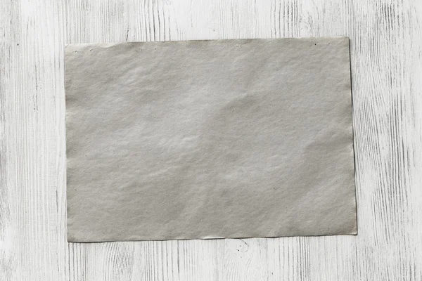 Kağıt ahşap zemin üzerinde