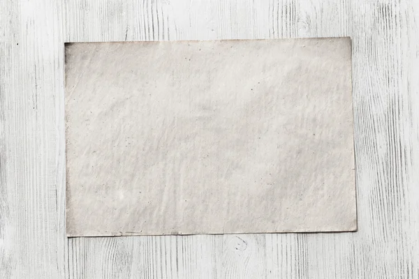 Kağıt ahşap zemin üzerinde