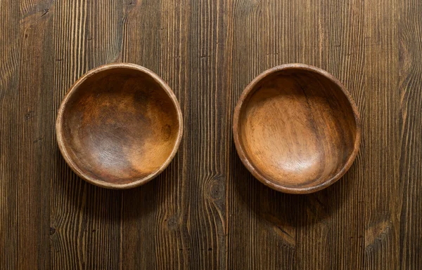 Wooden bowls on table — Stock Photo, Image