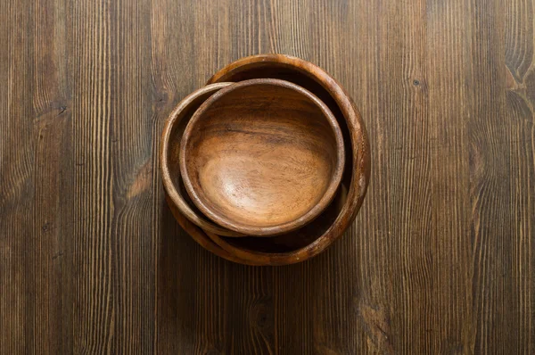 Wooden bowls on table — Stock Photo, Image