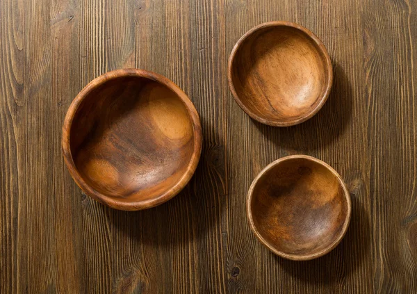 Wooden bowls on table — Stock Photo, Image