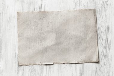 ahşap zemin üzerinde boş kağıt