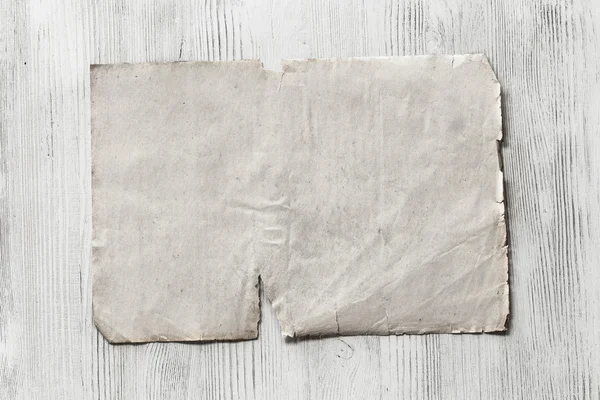 Czysty papier na drewniane tła — Zdjęcie stockowe