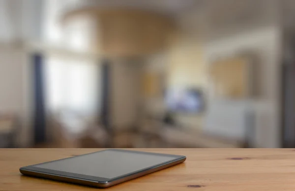 Digital tablet on wooden table — Stock Photo, Image