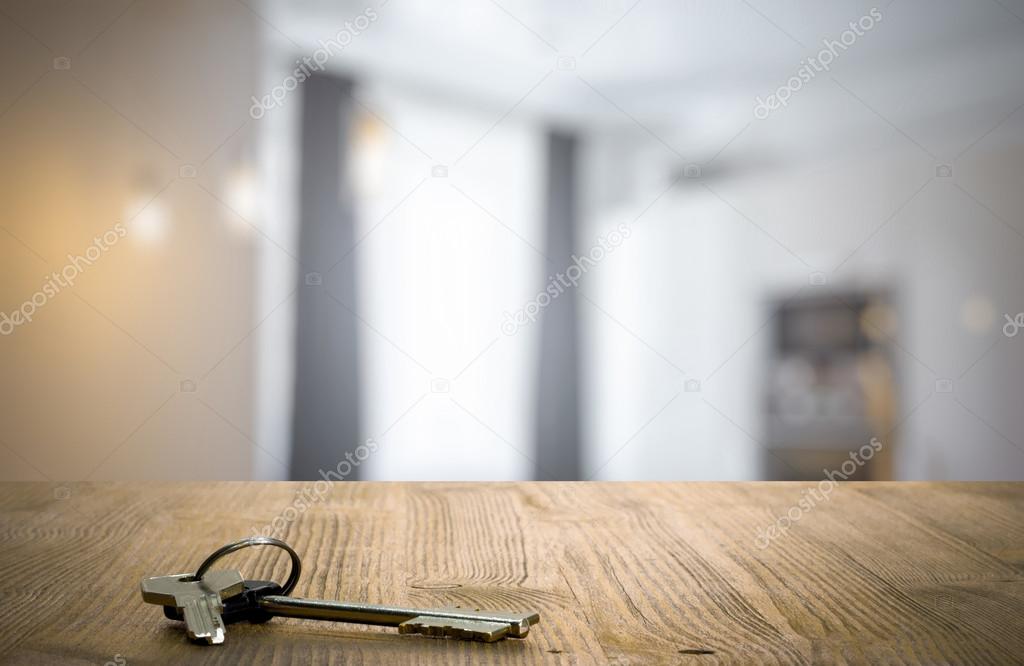 Metal keys laying on table