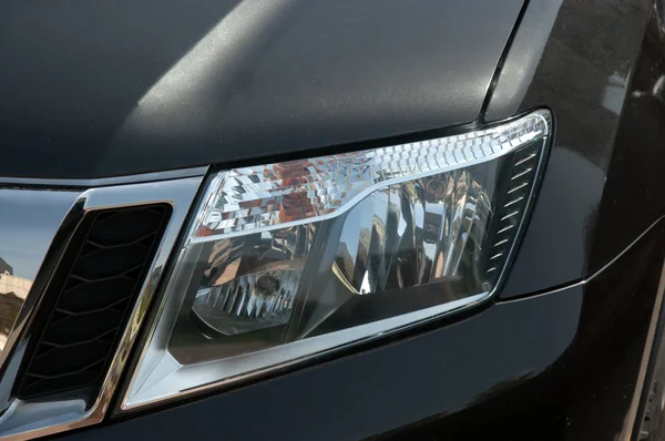 Modern car headlight — Stock Photo, Image