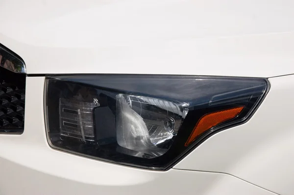 Modern car headlight — Stock Photo, Image