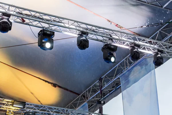 spotlights on a stage lighting rig