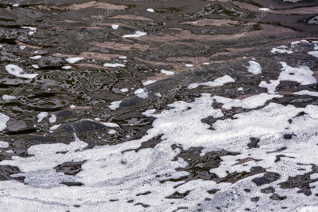 Foam floating on a water surface — Stock Photo © MrTwister 51810117