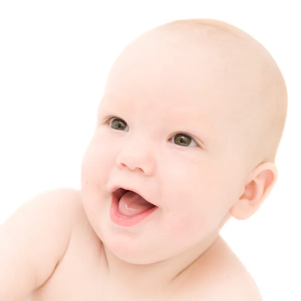 Funny little baby lying on white bed — Stock Photo, Image