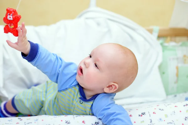 Baby playing with toys — Stock Photo, Image