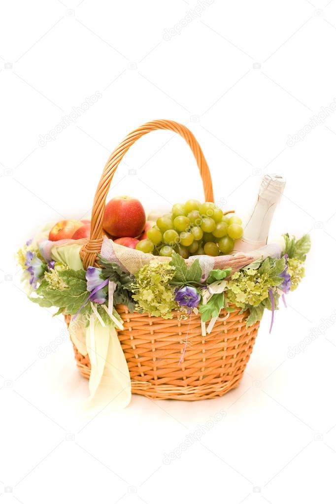 Fruit basket with a bottle of champagne