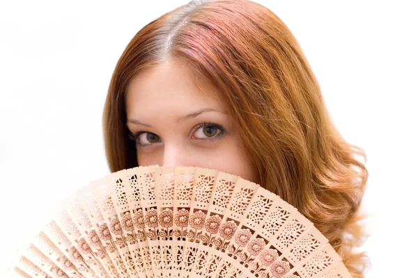 Girl close your face by fan — Stock Photo, Image
