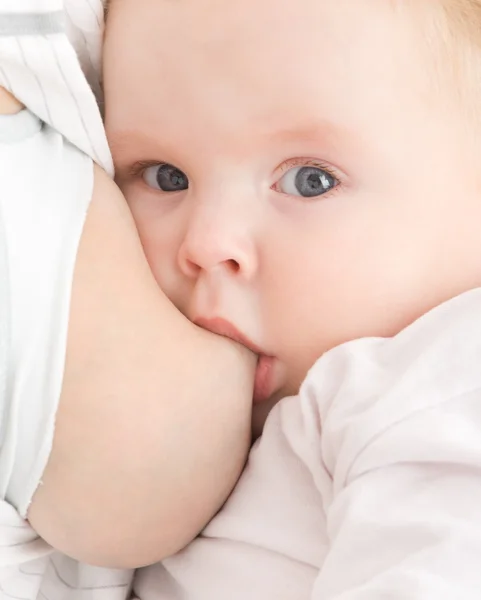 Mother breast feeding her son — Stock Photo, Image