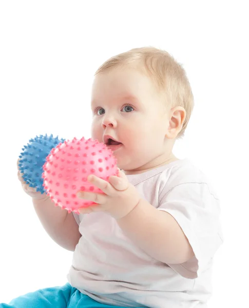 Portret van kleine jongen met twee massage-ballen — Stockfoto