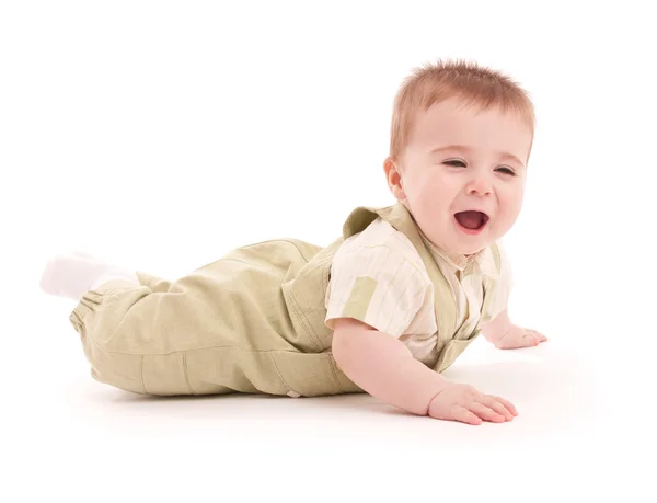 Портрет восхитительного голубоглазого младенца, лежащего на полу — стоковое фото