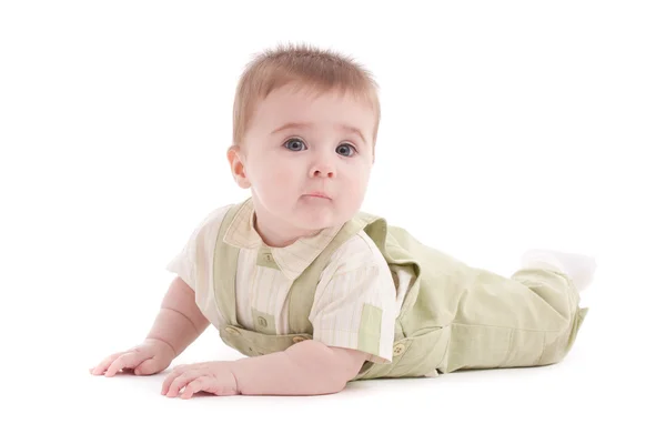 Portrait d'adorable bébé aux yeux bleus couché — Photo