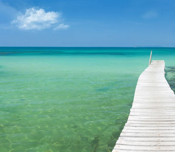 View from the pier on the sea at loneliness beach — Stock Photo, Image