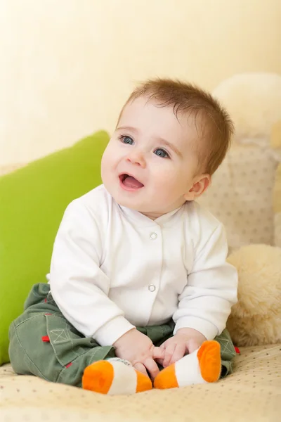 Porträtt av bedårande blue-eyes baby Stockbild