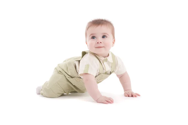 Porträt eines entzückenden blauäugigen Babys im Liegen lizenzfreie Stockbilder