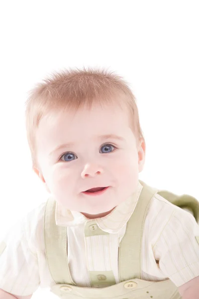 可爱的蓝眼睛宝宝躺的肖像 免版税图库照片