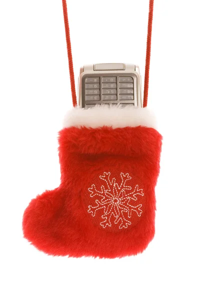 Meia de Natal vermelho com telefone celular — Fotografia de Stock