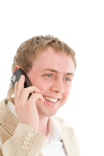 Un homme d'affaires souriant appelle par téléphone portable — Photo