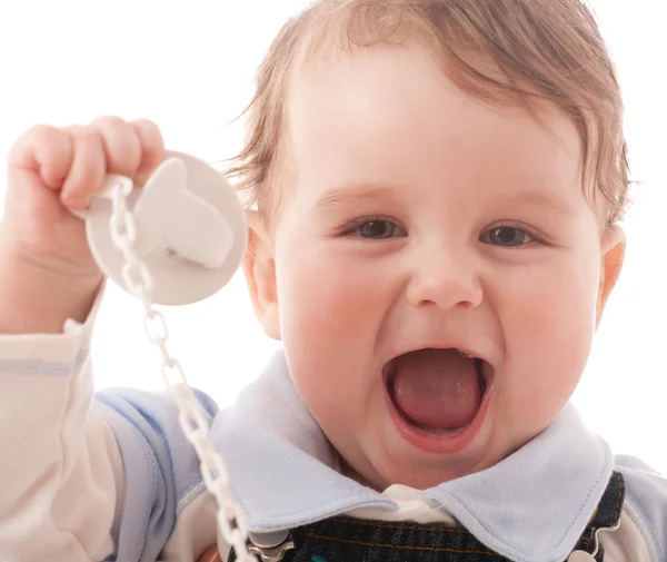 Portrait of joyful baby boy with pacifier — Stock Photo, Image