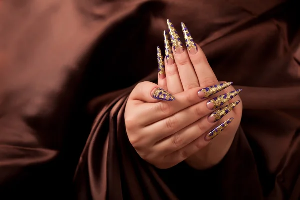 Hands with long fingernail and beautiful manicure — Stock Photo, Image