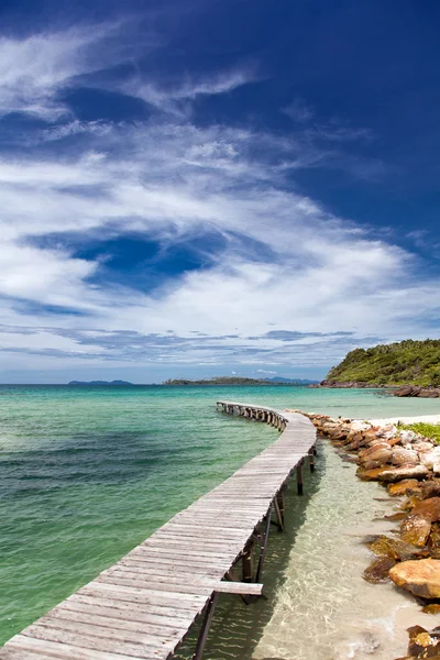 View from the pier on the sea at loneliness beach — Stock Photo, Image