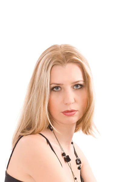 Portrait of blond in black dress and bead over white — Stock Photo, Image