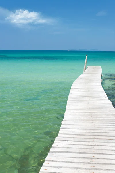 View from the pier on the sea at loneliness beach — Stock Photo, Image