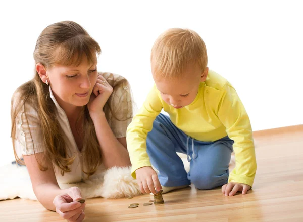 Cute boy with mother learn to count money at home — Stock Photo, Image